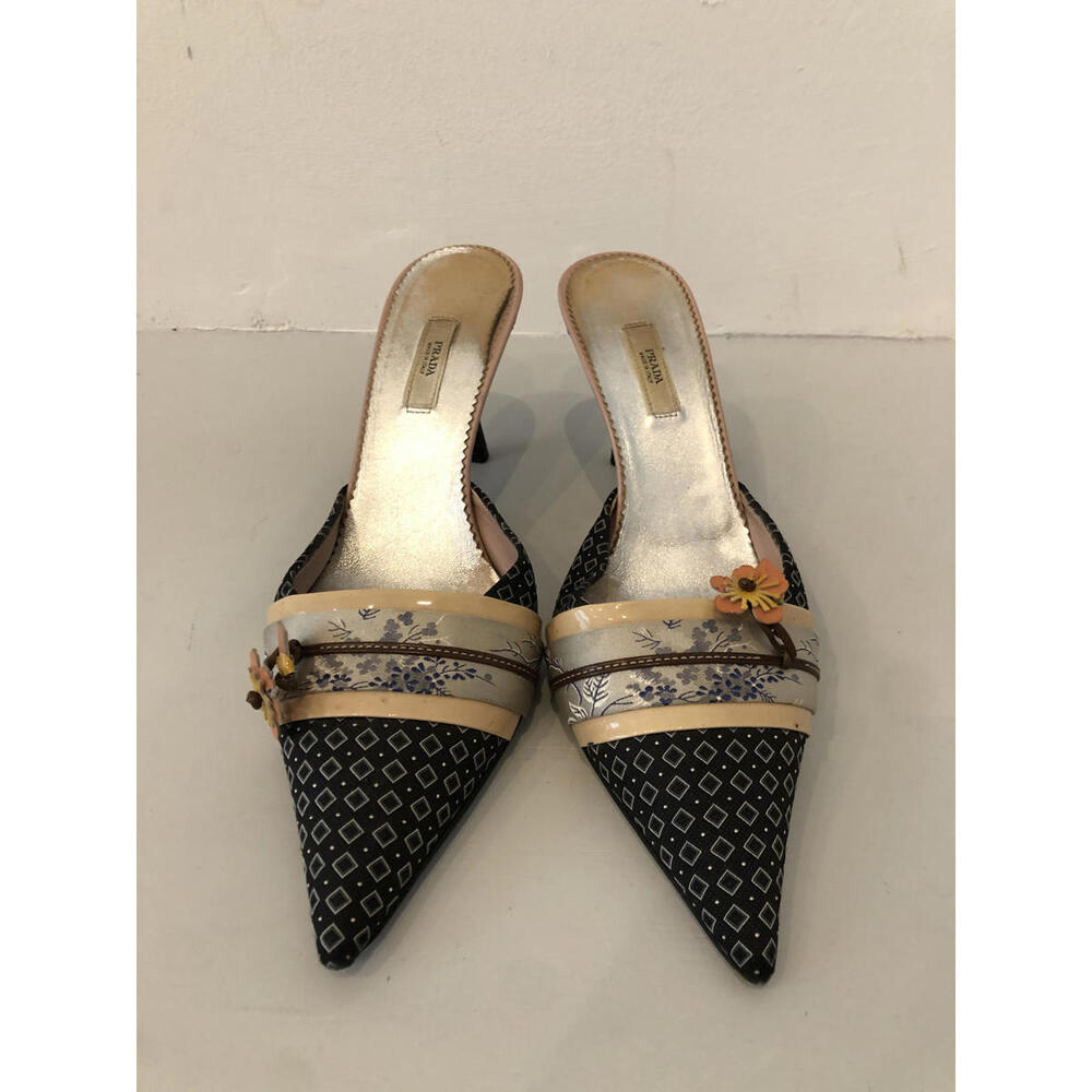 Elegant Black Prada Heels with Floral Accent